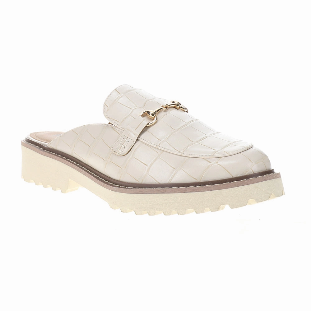 Wingin It Embossed Lug Sole Mules Modern Classic